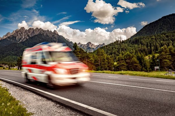 Ambulance van rushes down the highway