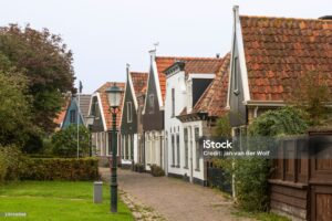 Narrow street in the village of Oudeschild on the Dutch island of Texel.